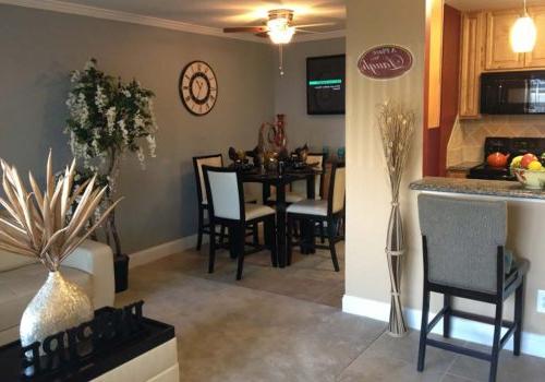 Decorated and fully furnished dining area and kitchen at Haverford Court apartments for rent
