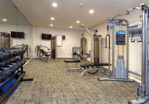 Fitness center with exercise equipment at Haverford Court apartments for rent in Philadelphia, PA