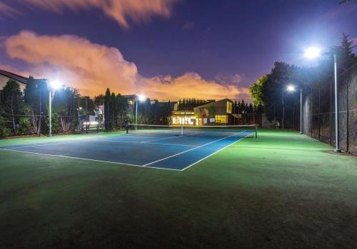 Night time exterior of tennis court