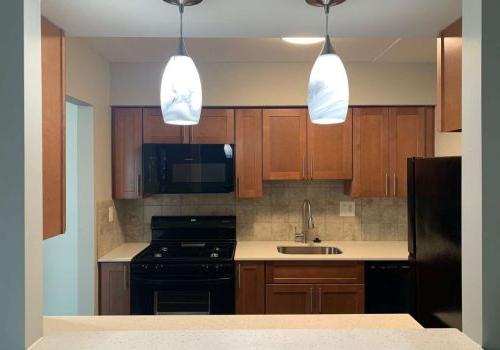 Modern Kitchen with quartz countertop and new lighting
