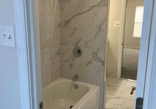 Marbled shower and bathtub